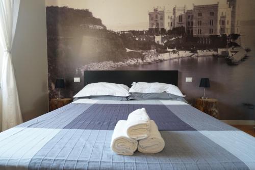 Ένα ή περισσότερα κρεβάτια σε δωμάτιο στο Garibaldino Rooms
