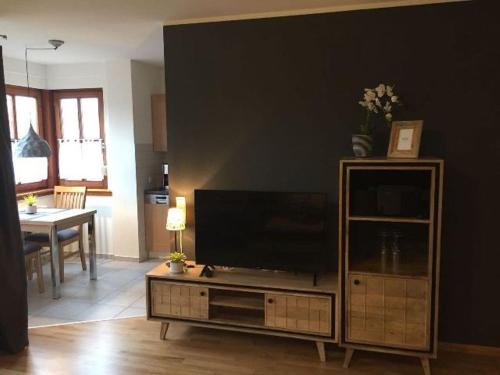 Μια τηλεόραση ή/και κέντρο ψυχαγωγίας στο Appartements am Park