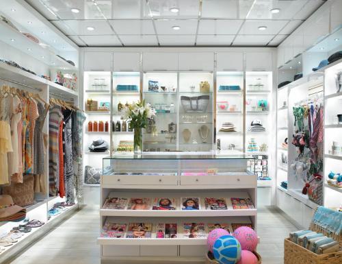 a retail store with a lot of clothes on display at Grand Beach Hotel in Miami Beach
