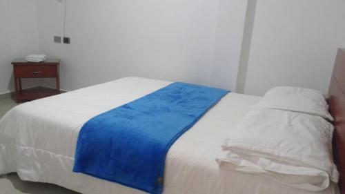 Postel nebo postele na pokoji v ubytování Hotel Manzanares Baranoa