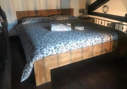 Una cama o camas en una habitación de Residenza Il Rustico Lago Maggiore
