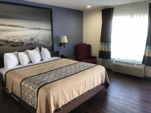 Кровать или кровати в номере Northgate Motel