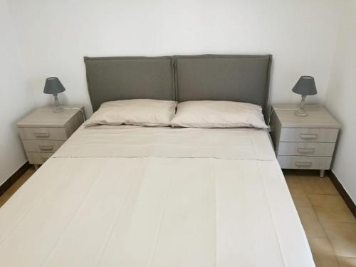 A bed or beds in a room at dreams on the sea