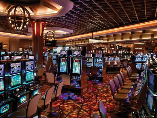 a casino filled with lots of slot machines at L'Auberge Baton Rouge in Baton Rouge