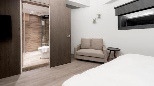 Katil atau katil-katil dalam bilik di Wountain Hotel