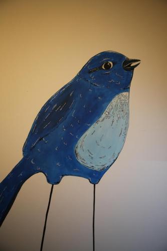 a blue bird painted on the side of a cake at Old Fire Station Backpackers in Fremantle