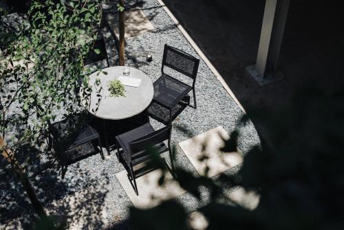 an overhead view of a table and chairs at Lloyd's Inn Bali in Seminyak