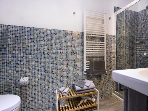 a bathroom with a shower and a toilet and a sink at Marymar in Monterosso al Mare