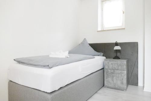 Postel nebo postele na pokoji v ubytování Hotel Weserstuben