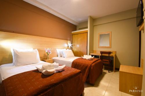 En eller flere senge i et værelse på Hoteles Paraiso CHICLAYO