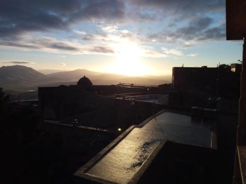 a view of the sunset from the roof of a building at Hotel Edelweiss in Erice