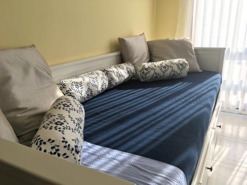 מיטה או מיטות בחדר ב-Mira Maia Apartment
