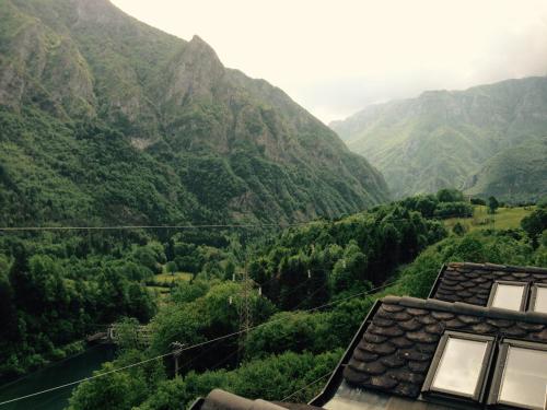 a view of a valley with mountains in the background at albergo panoramico in Lenna