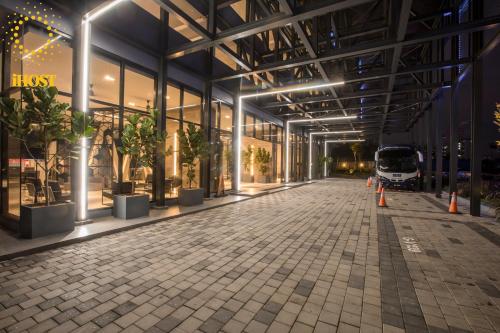 a building with potted plants inside of it at Expressionz Suites By iHost Global in Kuala Lumpur