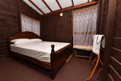 Postel nebo postele na pokoji v ubytování Pidurangala View Home Stay