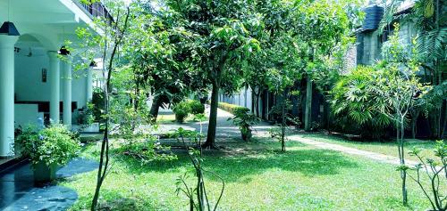 
A garden outside Unawatuna Nor Lanka Hotel
