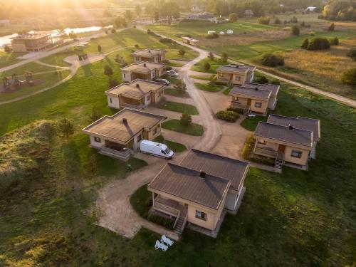 an overhead view of a bunch of houses with a car in front at Kapteinu Osta in Salacgrīva