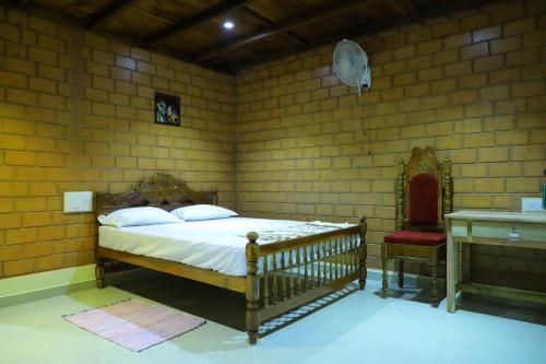 Postel nebo postele na pokoji v ubytování The Munroe Vibes Inn