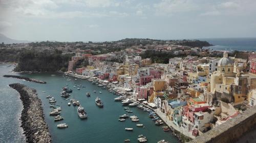 an aerial view of a harbor with boats in the water at Hotel La Casa sul Mare in Procida