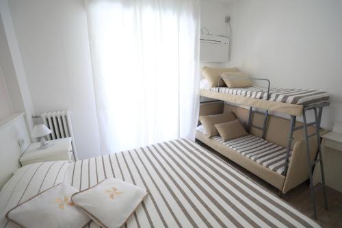 Katil atau katil-katil dalam bilik di Hotel Continental