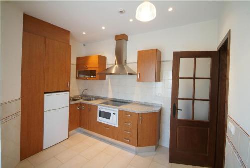Η κουζίνα ή μικρή κουζίνα στο Apartamentos Ardales