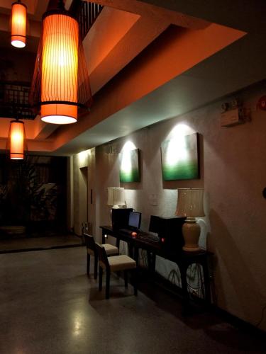 TV a/nebo společenská místnost v ubytování De Lanna Hotel