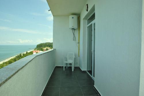 a balcony with a view of the ocean at the View Apartment in Makhinjauri