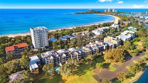 an aerial view of a resort near the beach at Spinnaker Quays in Mooloolaba