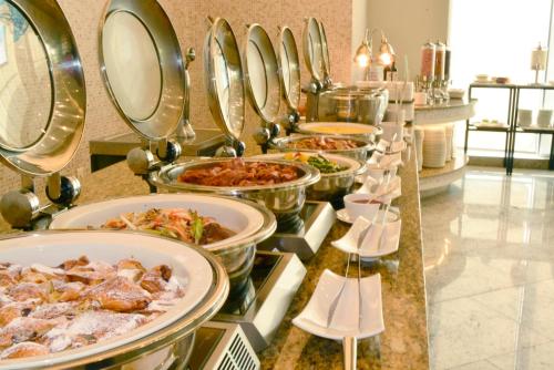 a buffet line with many plates of food at Stanford Hotel&Resort Tongyeong in Tongyeong