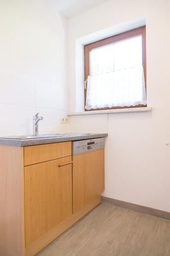 Cuisine ou kitchenette dans l'établissement Pension Peter