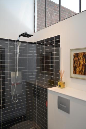 Ένα μπάνιο στο Chambre d'hôtes la Teinturerie