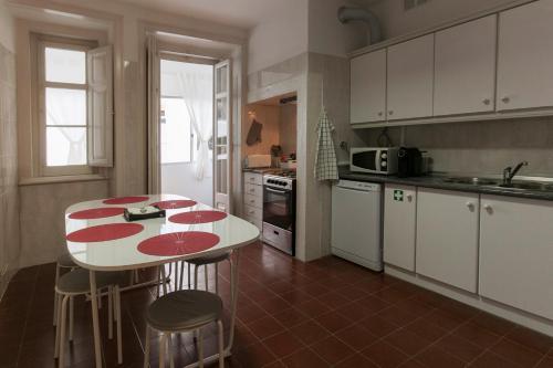 Kuchyň nebo kuchyňský kout v ubytování Lisbon City Center Apartment