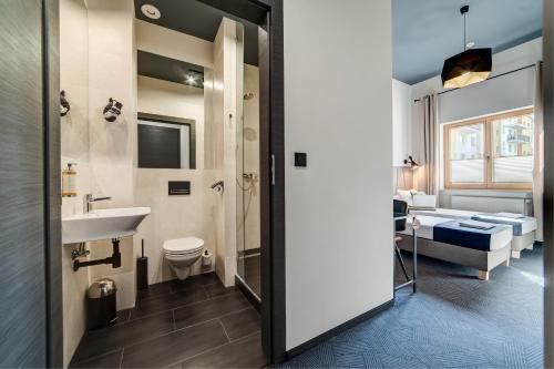 Kúpeľňa v ubytovaní GoldApartRooms