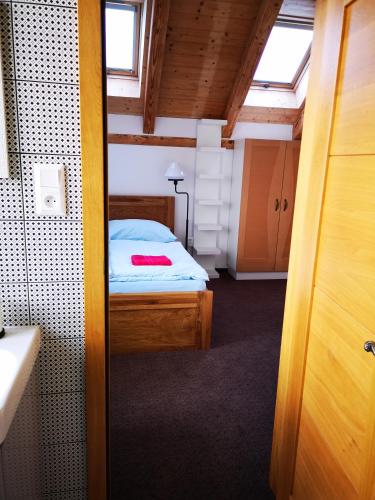 Postel nebo postele na pokoji v ubytování Vila Lednice