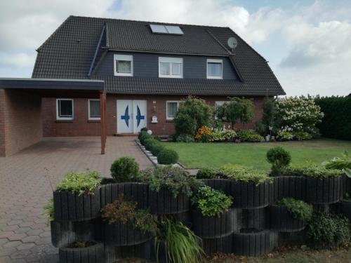 a house with a fence in front of it at Marina in Bleckede