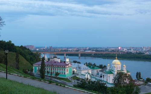 a large building with a lighthouse on top of it at AZIMUT Hotel Nizhniy Novgorod in Nizhny Novgorod