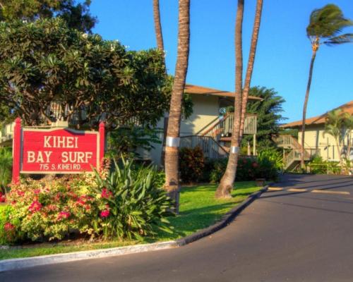 a sign in front of a house with a kilt day surf sign at Kihei Bay Surf 130- Garden View Studio, FREE PARKING in Kihei