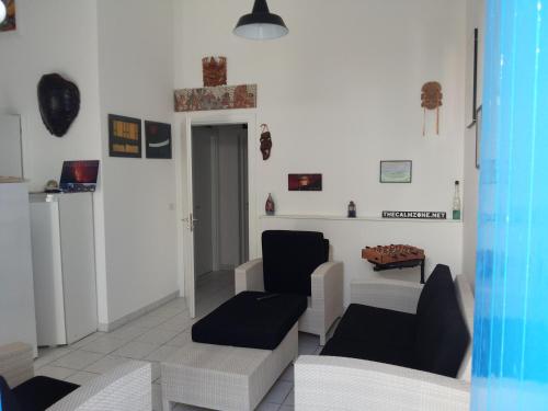 Area soggiorno di Mediterranea Guesthouse B&B