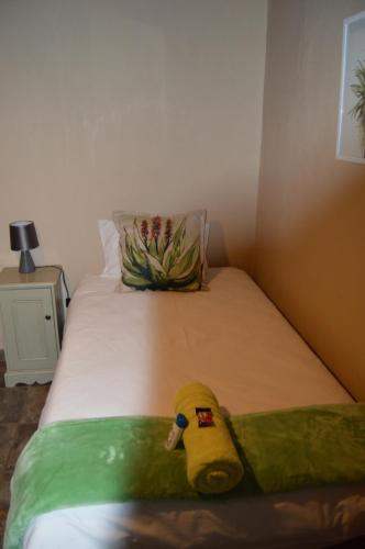 Ένα ή περισσότερα κρεβάτια σε δωμάτιο στο Esmarline Lodge