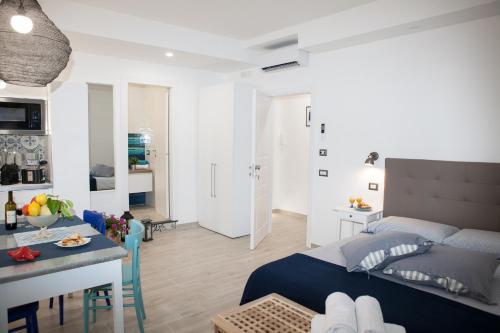 Posteľ alebo postele v izbe v ubytovaní Sorrento Time Guest House