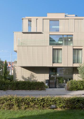 a large building with glass windows on the side of it at Residence Appartements in Zürich
