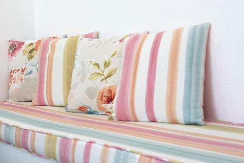 Letto o letti in una camera di Nissos Thira