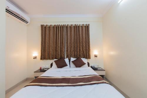 Cama ou camas em um quarto em Hotel Linkway