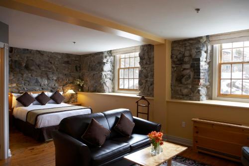 Кровать или кровати в номере Moulin Wakefield Mill Hotel & Spa