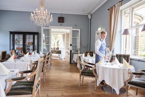 Restavracija oz. druge možnosti za prehrano v nastanitvi Hotel Vejlefjord