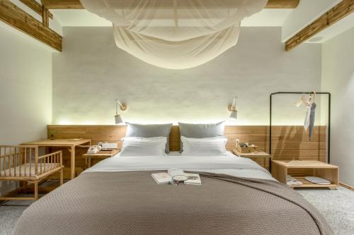 Hongcun old street Country Houseにあるベッド