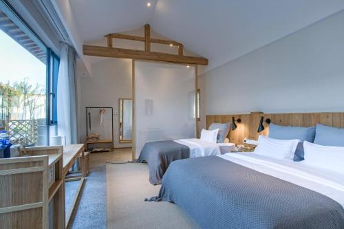 Hongcun old street Country Houseにあるベッド