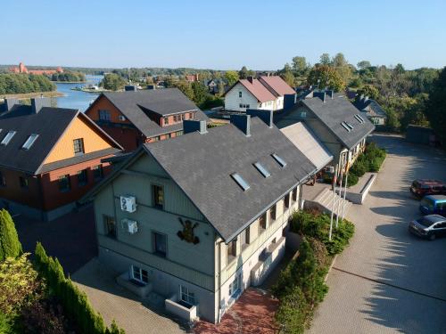 an aerial view of a large house with a driveway at Rowing Hotel in Trakai