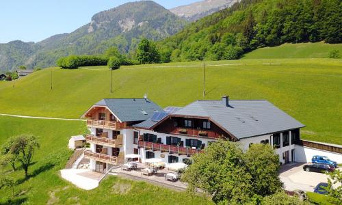 an aerial view of a large house in a field at Altroiterhof in St. Wolfgang