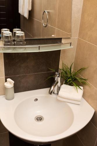 Ένα μπάνιο στο CityHome Aparthotel